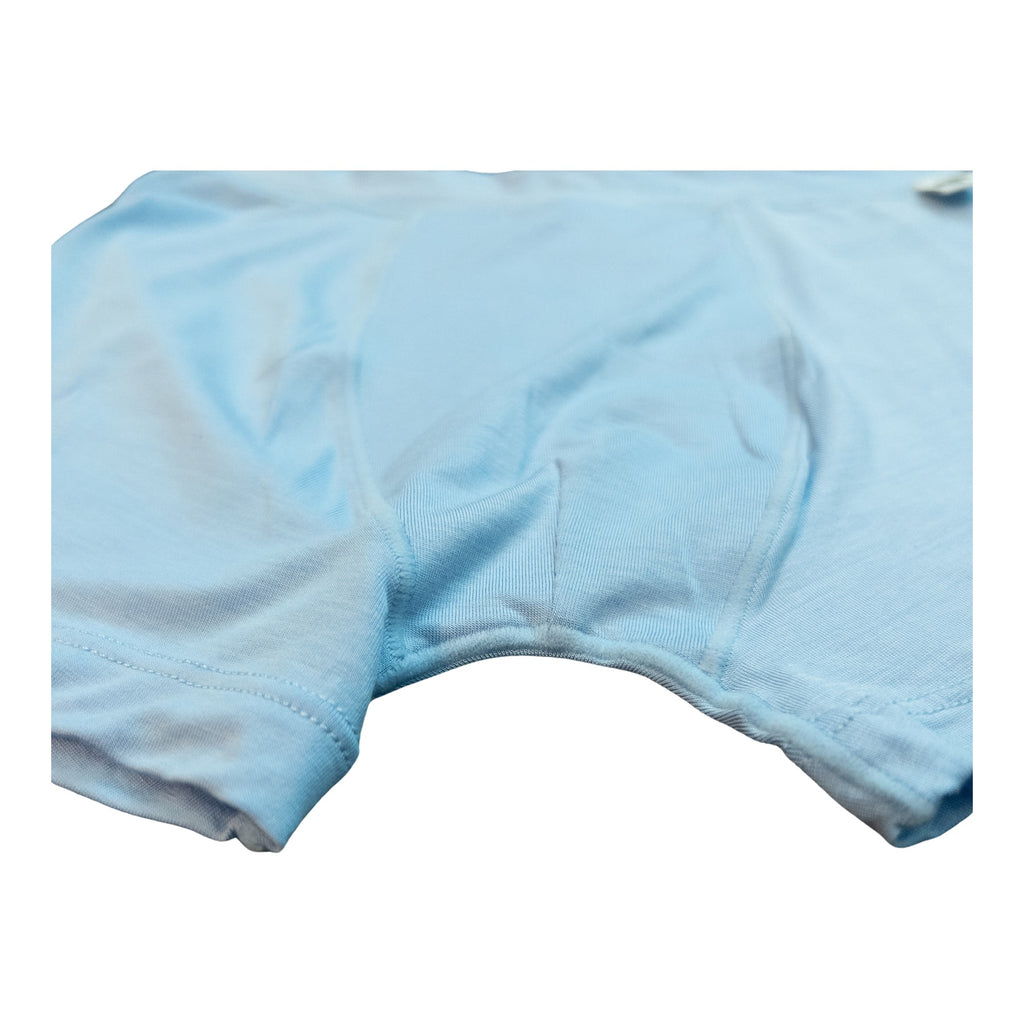 The side profile and leg openings of Primal Play boxer briefs laid flat